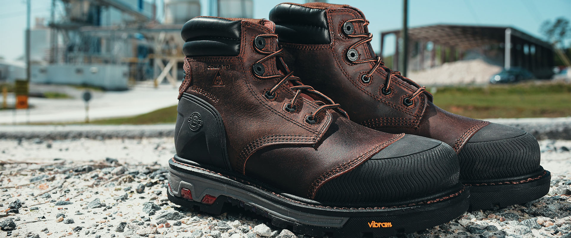 Justin Warhawk nano comp toe botas con cordones en marrón